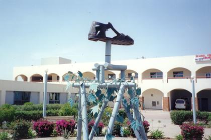 The rubber sandal symbolizes the 30 years of struggle for freedom