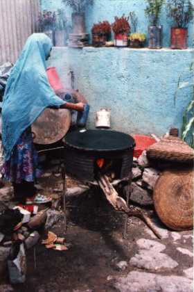 Eritrea - Asmara (Sembel) Aster's sister in law is making injera.
