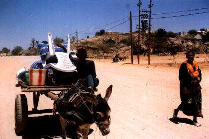 Eritrea - Barentu. Household furniture, bought (in Asmara) for my mother. Here, we are passing Barentu, on our way to the refugee camp in Adi Keshi.