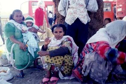 Mede Ertra bus station Asmara Eritrea - women waiting for the bus.