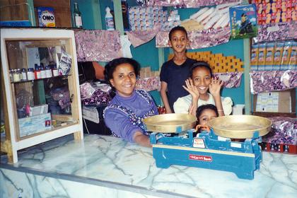 Wife and children of Feshaye in their little grocery shop in Sembel.