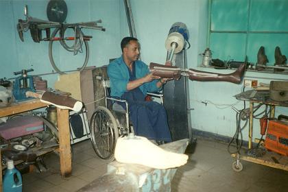 Handicapped soldier making prosthesis in the rehabilitation center - Former Kagnew Station Asmara Eritrea.
