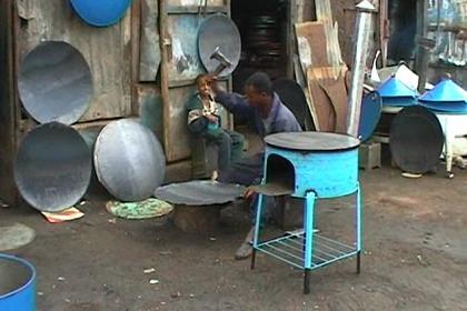 Making household utensils at the Medeber market.