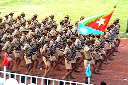 Military parade - earlier Yikaalo troops - Asmara Stadium.