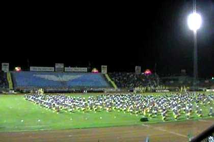 Thousands of schoolgirls giving a dance performance - Asmara Stadium.