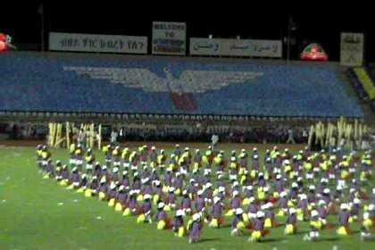 Thousands of schoolgirls giving a dance performance - Asmara Stadium.