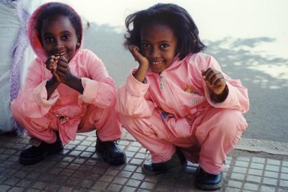 Two little girls waiting for the bus - Asmara Eritrea.