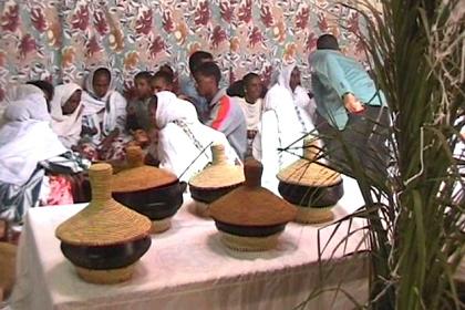 Injera for the guests is brought in.