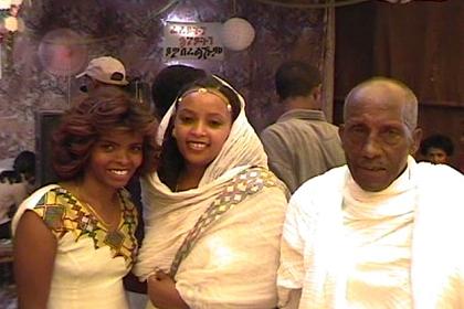 Father of the bride with his two beautiful daughters.