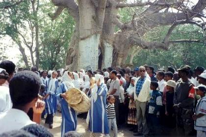 Various groups making music and dancing at the festival of Mariam Dearit.