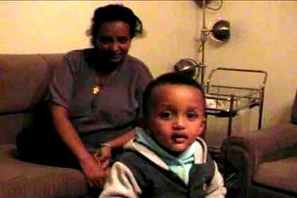 Terhas and her son Hiab in their apartment in the Sembel Residentional Complex.