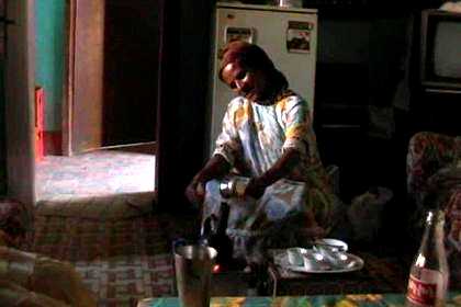 Feshaye's wife and my sister in law Yordanos, making Eritrean coffee.