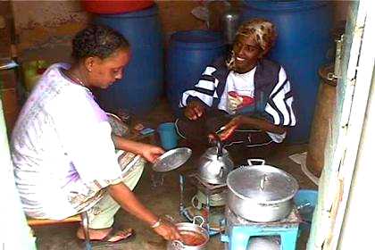 Selamawit and Gorzite cooking me pasta in the small kitchen next to the house.