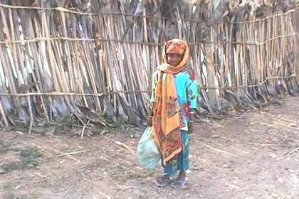 Traditional dressed girl in Agordat.