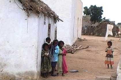 Children in front of their house in Afabet.