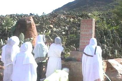 The woman praying for the dead Patriarch on the foot of Mount Bizen.