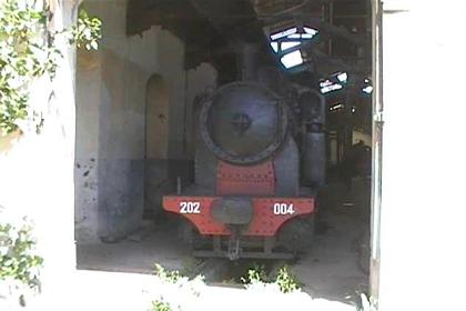 Antique loc waiting for rehabilitation at the Asmara steam depot.