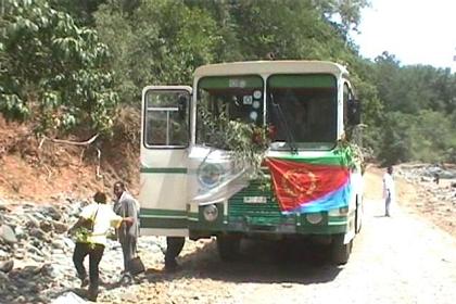 The chartered bus arriving in the Filfil Forest.