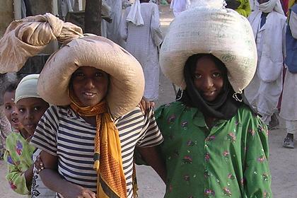 Local children carrying grain - Agordat Eritrea.