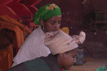 Girls at work - Medeber market Asmara.
