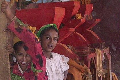 Girls posing in one of the workshops - Medeber market Asmara.