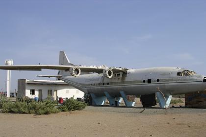 Stripped CCCP Antonov 12BP, damaged beyond repair on landing at Massawa Airport - Massawa bus terminal.