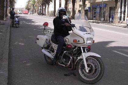 Member of the Asmara police on Harnet Avenue Asmara Eritrea.