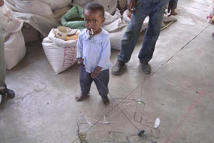 Small boy with iron wire toy - Adi Quala Eritrea.