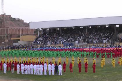 Singing the national anthem at the celebrations in Asmara Stadium.