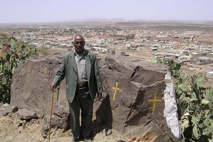 Kesete, father of Yordanos showing me the surroundings - Debarwa Eritrea.