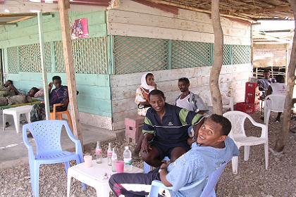 Michael and Tesfalem waiting for the bus to return - Thio Eritrea.