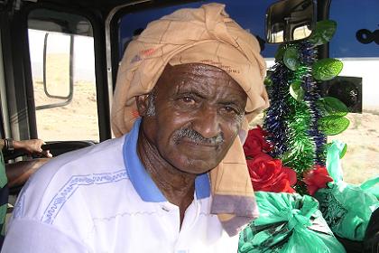 My neighbor in the bus to Massawa.