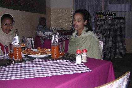 Eating a pizza in Pizzeria Eritrea - Asmara Eritrea.