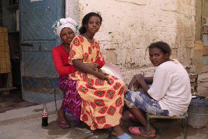 Three young women in front of their grocery shop - Massawa Eritrea.
