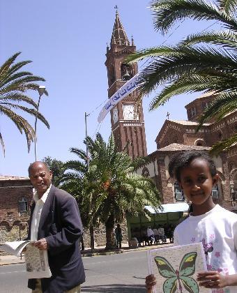 Jerusalem, holding the artwork of Fred Siwak, of Ipswich, in front of the Roman Catholic Cathedral - Asmara Eritrea.