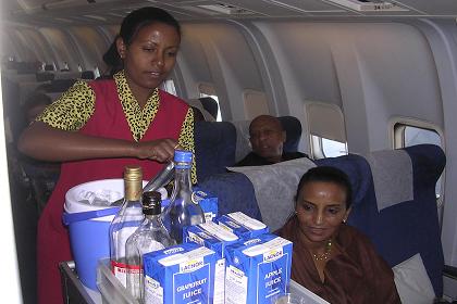 Drinks being served by Lem Lem - Eritrean Airlines flight attendant.