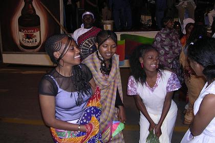 Women of various ethnic groups, singing and displaying traditional dance. Celebrations of 14th Independence Day - Bathi Meskerem Asmara Eritrea.