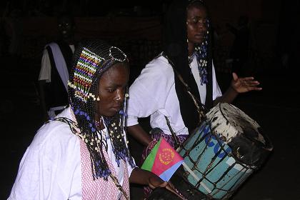 Kunama traditional troupe singing
and displaying the Kunama tradition. Celebrations of 14th Independence Day - Bathi Meskerem Asmara Eritrea.