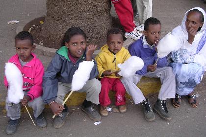 Children enjoying spun sugar - Asmara Eritrea.