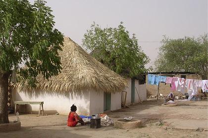 Woman cooking - Barentu Eritrea.