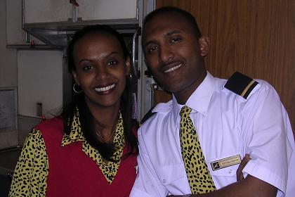 "Thank you for flying Eritrean Airlines, we hope to meet you on one of our next flights". Flight attendants Meraf (left) and Taha (right).