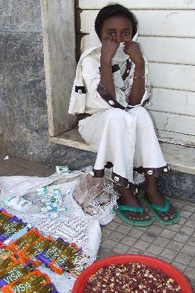 Young girl selling peanuts and candy - Asmara Eritrea.