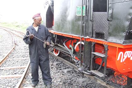 Preparation of the steam engine - Expo grounds Asmara Eritrea.