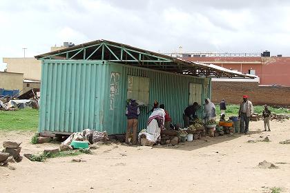 Workshop / women selling beles (cactus fruits) - Tegadelti Street Godaif Asmara Eritrea.