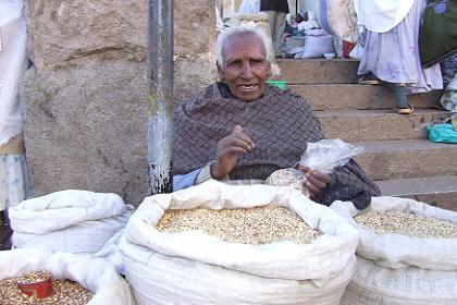 Old woman selling grain - Eritrea Square Asmara Eritrea.