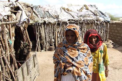 Two blind daughters of Mohamed Nur Abubeker in their settlement - Afabet.