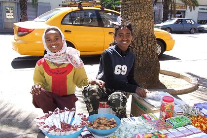 Small scale trade on the sidewalks of Harnet Avenue - Asmara Eritrea.