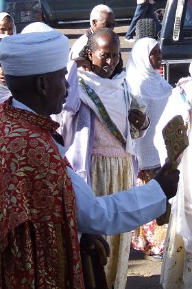Priest giving his blessings to the visitors of the feast - St. Michaels anniversary (Nigdet) - Asmara Eritrea.