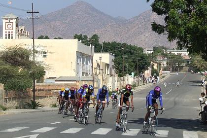 Bicycle race on one of the many broad, tarred and well maintained streets of Keren Eritrea.