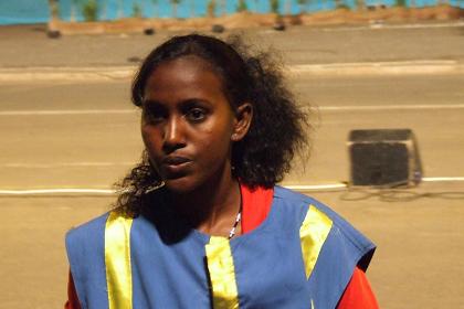 Student keeping an eye on the public - Bathi Meskerem Square Asmara Eritrea.